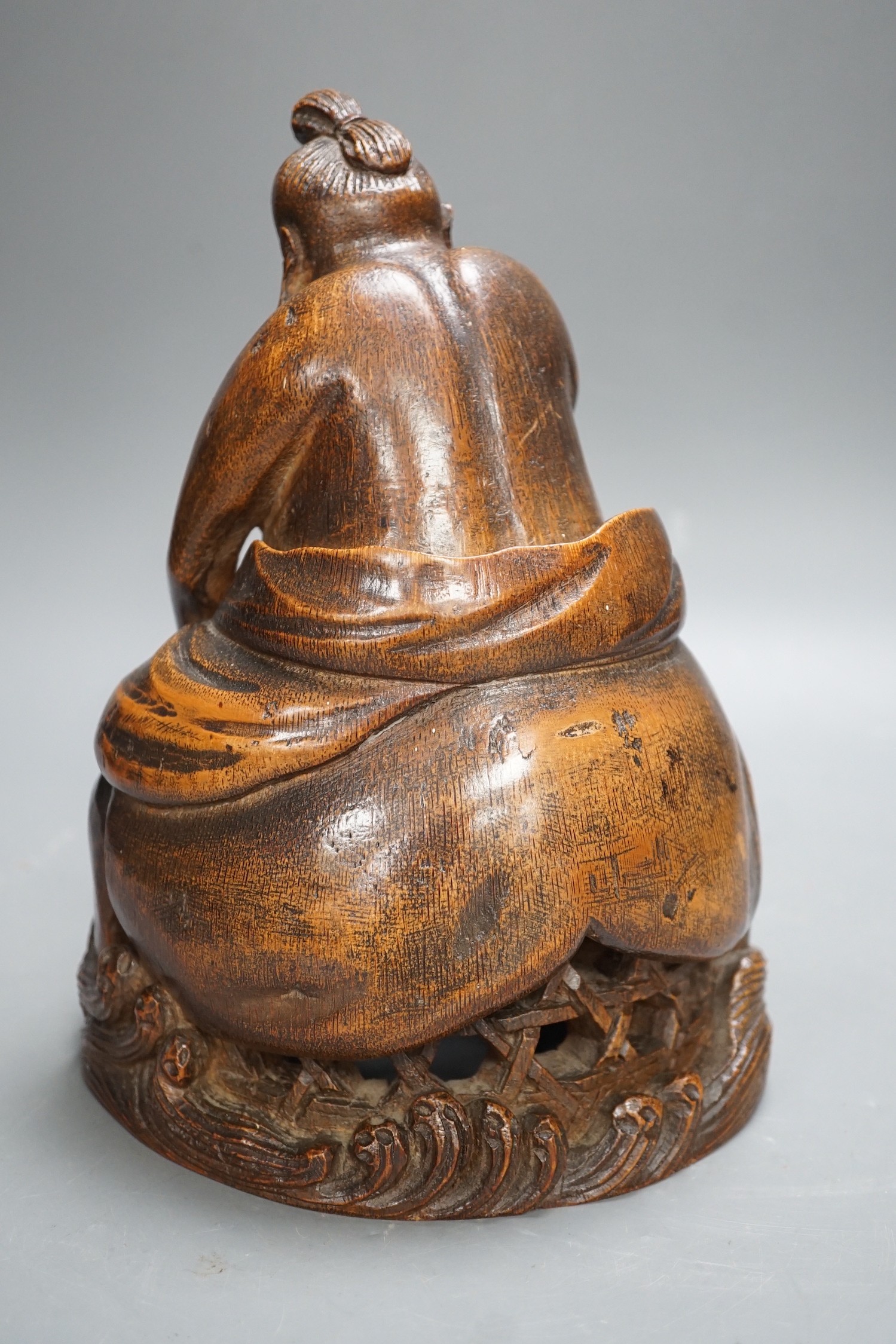A Chinese bamboo figure of a fisherman, 19th century, 23cms high